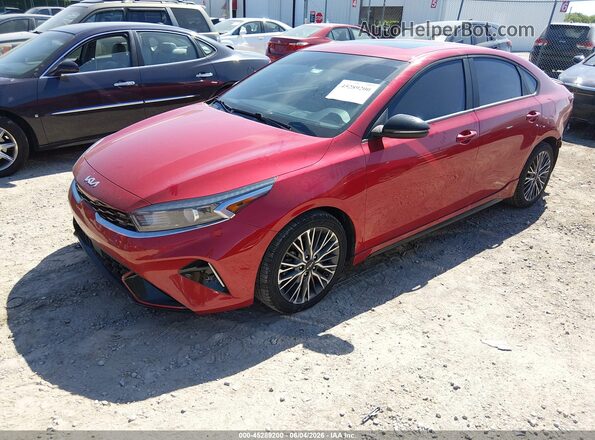 3KPF54AD9RE807383 2024 KIA FORTE Red Առջևի ձախ երեք քառորդ տեսարան
