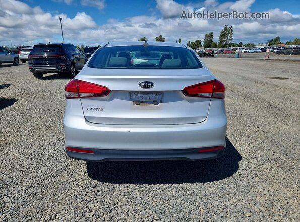 3KPFK4A70HE090213 2017 KIA FORTE Gray Вид ззаду