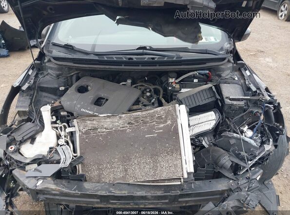 3KPFK4A76HE099675 2017 KIA FORTE Black უკანა ხედი