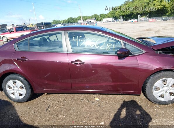 3KPFK4A78HE108506 2017 KIA FORTE Maroon Rear interior view