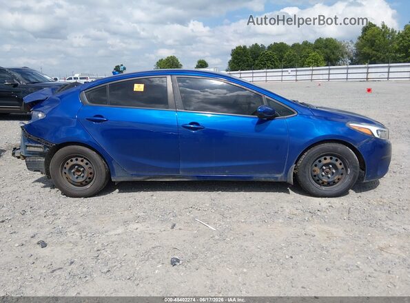 3KPFL4A73HE131012 2017 KIA FORTE Blue უკანა სალონის ხედი
