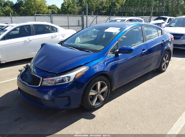 3KPFL4A75JE194571 2018 KIA FORTE Blue Առջևի ձախ երեք քառորդ տեսարան