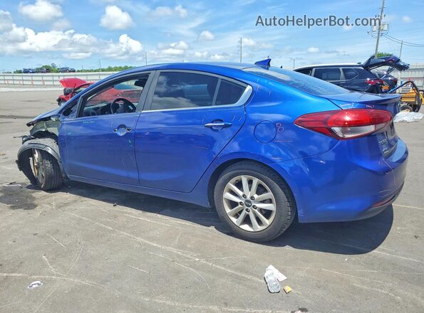 3KPFL4A76HE144255 2017 KIA FORTE Blue Trasero izquierdo
