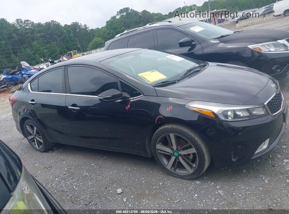 3KPFL4A80HE004968 2017 KIA FORTE Black Widok wnętrza z tyłu