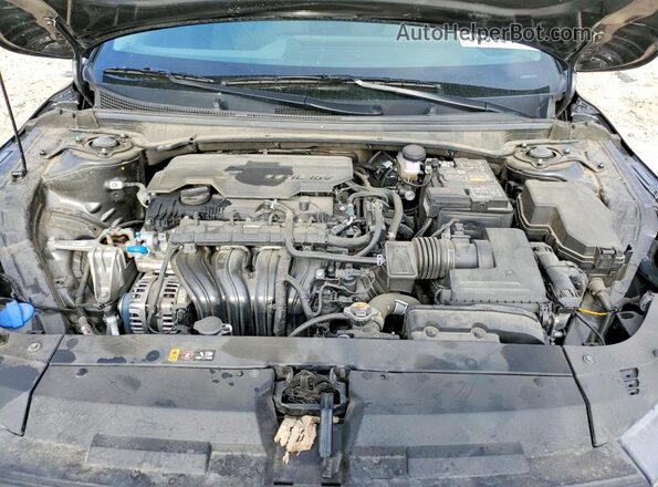 3KPFT4DE8SE068555 2025 KIA K4 Charcoal უკანა სალონის ხედი