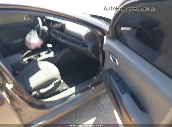 3KPFT4DEXSE169225 2025 KIA K4 Gray Front interior view