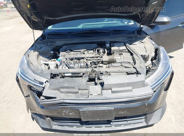 3KPFT4DEXSE169225 2025 KIA K4 Gray Rear view