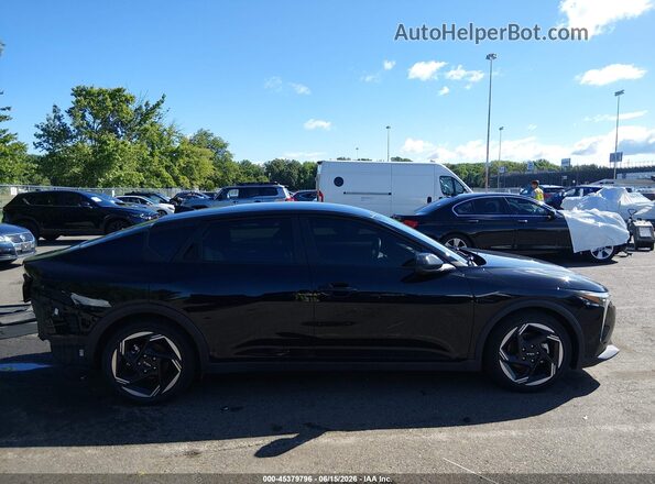 3KPFU4DE1SE007660 2025 KIA K4 Black Vista interior trasera
