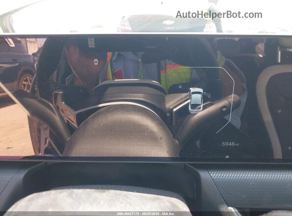3KPFW4DE0SE145748 2025 KIA K4 Silver Rear seats view