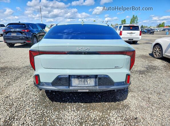 3KPFW4DE1SE166902 2025 KIA K4 Бирюзовый Вид сзади