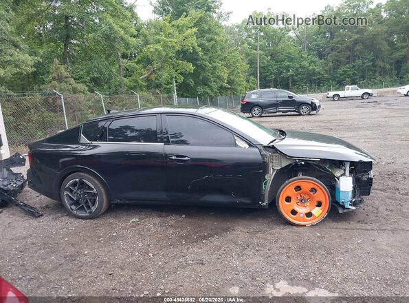 3KPFW4DE5SE040896 2025 KIA K4 Black უკანა სალონის ხედი