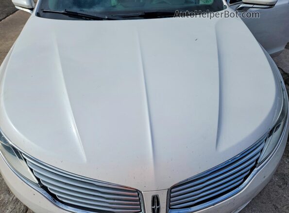 3LN6L2LU7GR624959 2016 LINCOLN MKZ White Սալոնի հետևի տեսք
