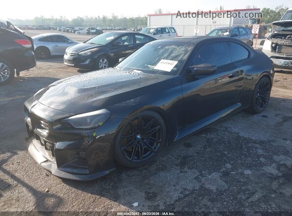 3MF13DM02R8D80598 2024 BMW M2 Black წინა მარცხენა ხედი სამი მეოთხედიდან