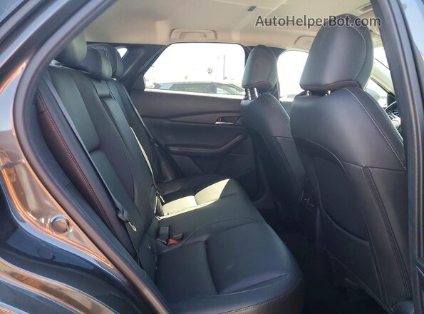 3MVDMBCM1RM699762 2024 MAZDA CX-30 Gray Widok wnętrza z tyłu