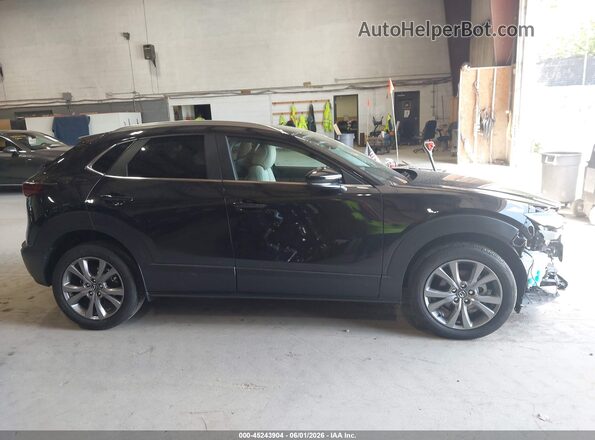 3MVDMBCM4RM710818 2024 MAZDA CX-30 Black Vista interior trasera