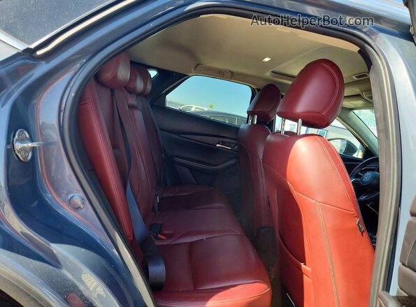 3MVDMBCM5RM647681 2024 MAZDA CX-30 Blue Vista interior trasera