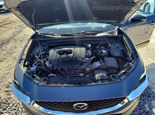 3MVDMBCM5RM647681 2024 MAZDA CX-30 Blue Vista del compartimento del motor