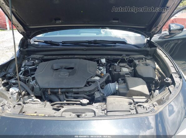 3MVDMBCM7SM800647 2025 MAZDA CX-30 Black Rear view