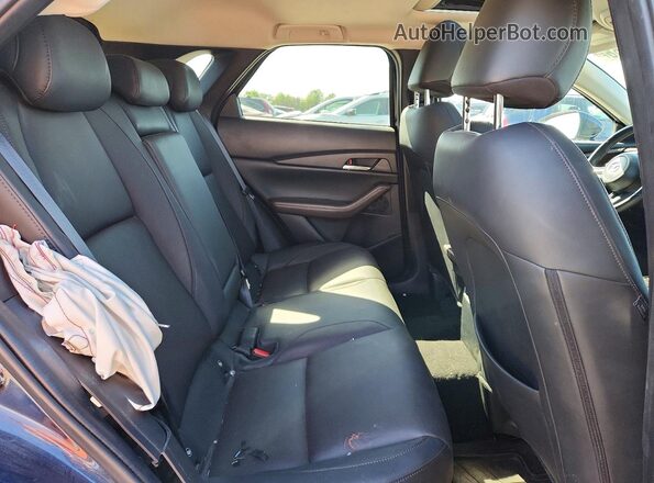 3MVDMBDM6PM517890 2023 MAZDA CX-30 Blue Vista de los asientos traseros