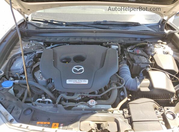3MVDMBEY3RM677696 2024 MAZDA CX-30 Gold Rear interior view