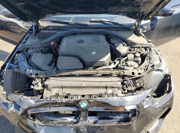 3MW23CM05S8F04660 2025 BMW 2 SERIES Black უკანა სალონის ხედი