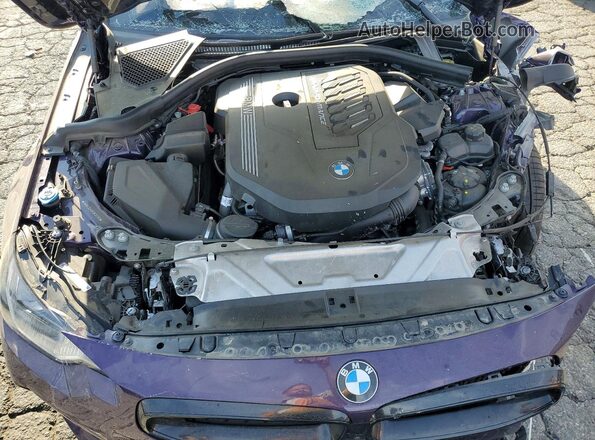3MW43CM05S8E91790 2025 BMW M2 Purple უკანა სალონის ხედი