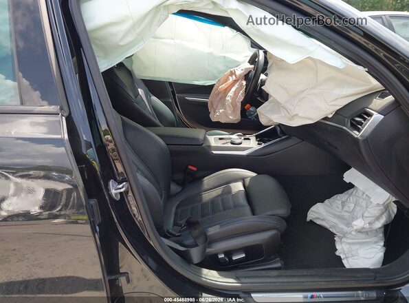 3MW49FF04P8C96199 2023 BMW M3 Black Vista interior delantera