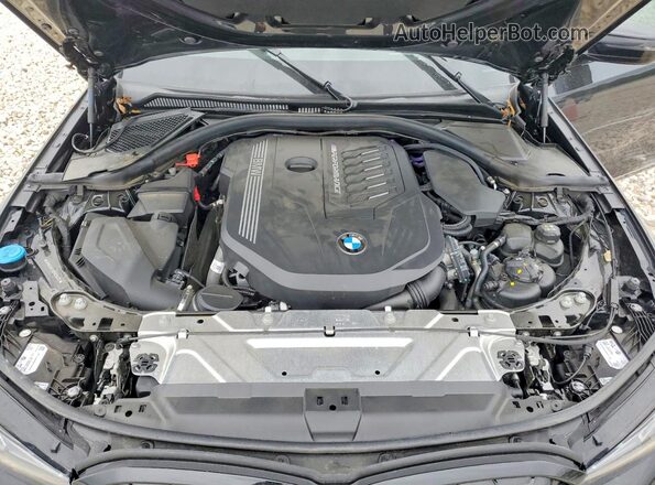 3MW49FF09P8C96375 2023 BMW M3 Black Սալոնի հետևի տեսք