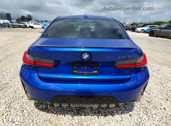 3MW49FS06R8D92487 2024 BMW M3 Blue უკანა ხედი