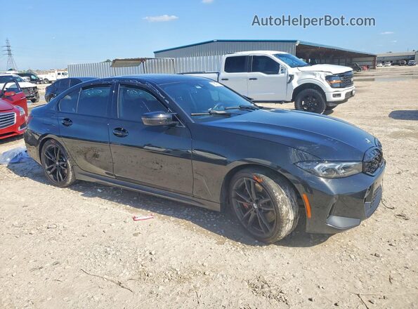 3MW49FS07P8D08111 2023 BMW M3 Черный Передняя правая четверть