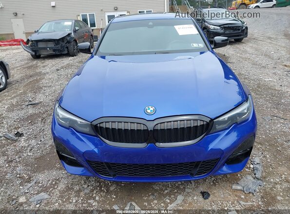 3MW5P9J0XN8C75793 2022 BMW 3 SERIES Blue Instrument cluster view