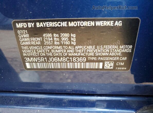 3MW5R1J06M8C18369 2021 BMW OTHER Blue Vista del compartimento del motor