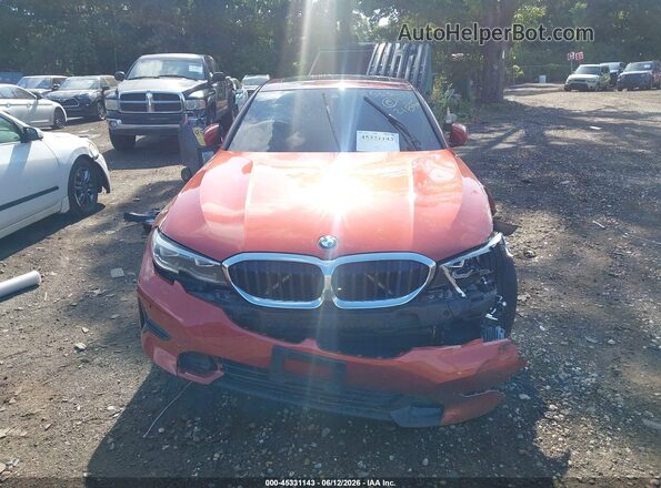 3MW5R7J00M8C02638 2021 BMW 3 SERIES Orange Widok z przodu