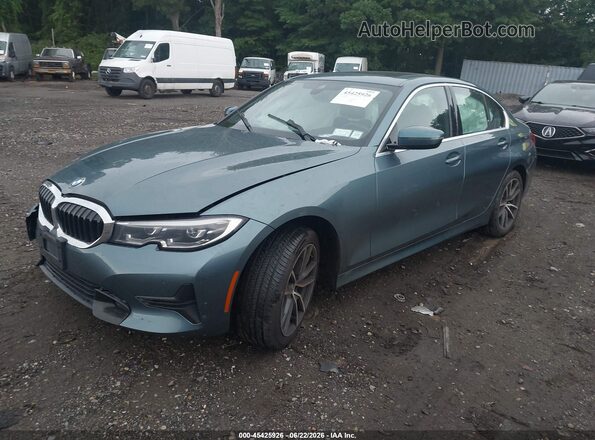 3MW5R7J09M8B94717 2021 BMW 3 SERIES Teal წინა მარცხენა ხედი სამი მეოთხედიდან