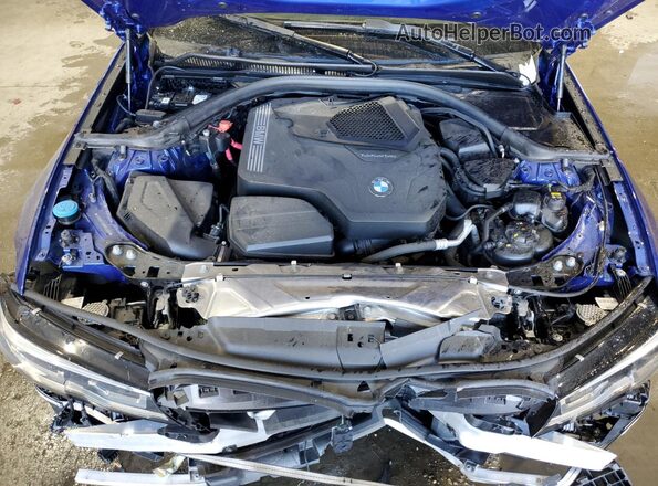 3MW5R7J09N8C40550 2022 BMW OTHER Blue Rear interior view