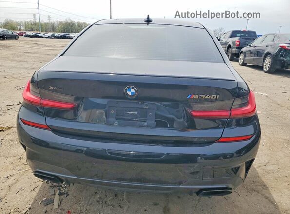 3MW5U9J00M8C08899 2021 BMW M3 Black Rear view