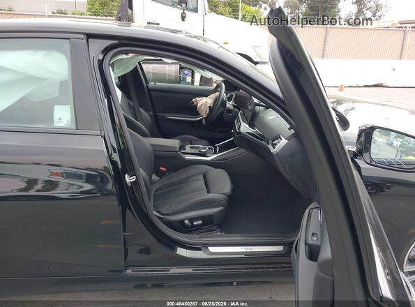 3MW69FF01P8D63494 2023 BMW 3 SERIES Черный Вид салона спереди