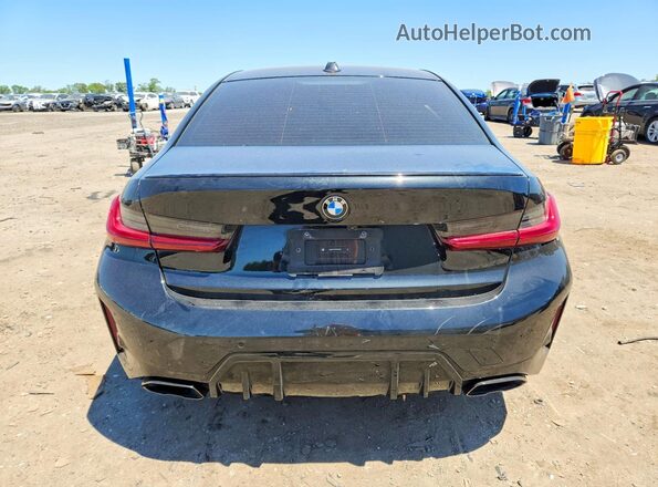 3MW69FT02S8F49865 2025 BMW M3 Black Vista trasera