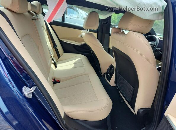 3MW89FF02P8D09310 2023 BMW 3 SERIES Blue Vista de los asientos traseros