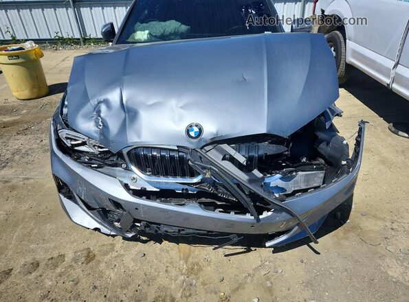 3MW89FF08P8D09733 2023 BMW 3 SERIES Серый Вид задней части салона