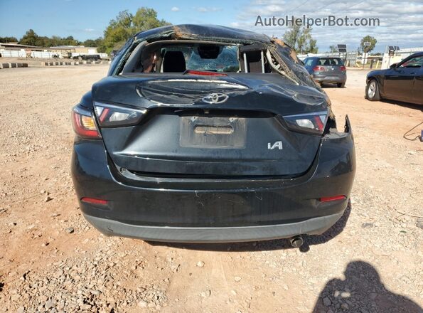 3MYDLBYV1HY176983 2017 TOYOTA YARIS Black Vista trasera
