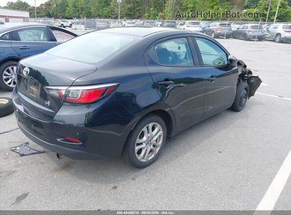 3MYDLBYV2JY319476 2018 TOYOTA YARIS IA Black Rear right