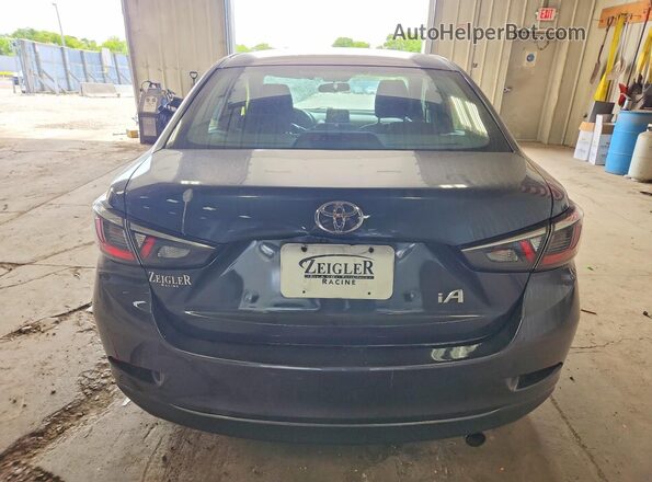 3MYDLBYV3JY326548 2018 TOYOTA YARIS Gray Rear view