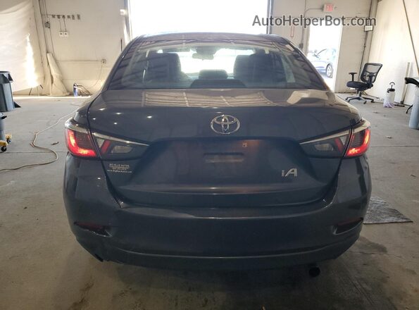 3MYDLBYV4HY156257 2017 TOYOTA YARIS Gray უკანა ხედი