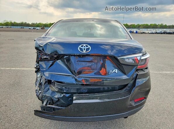 3MYDLBYV5HY180194 2017 TOYOTA YARIS Black უკანა ხედი