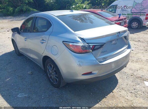 3MYDLBYV5KY504557 2019 TOYOTA YARIS Серебряный Задняя левая четверть