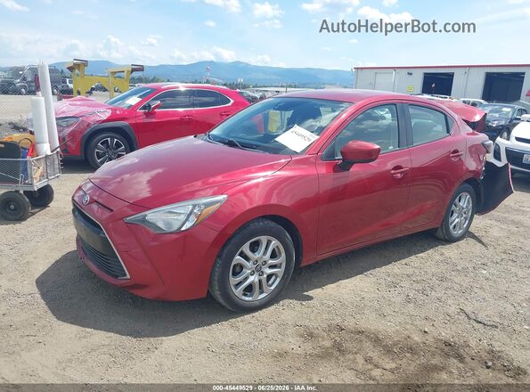 3MYDLBYV6JY302891 2018 TOYOTA YARIS IA Burgundy Front left