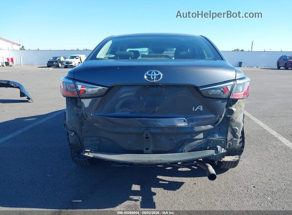 3MYDLBYV6JY312420 2018 TOYOTA YARIS IA Gray Vista frontal
