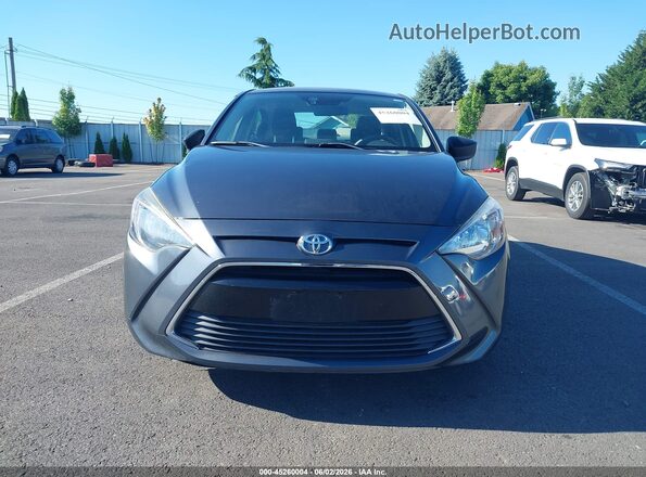 3MYDLBYV6JY312420 2018 TOYOTA YARIS IA Gray Vista interior trasera