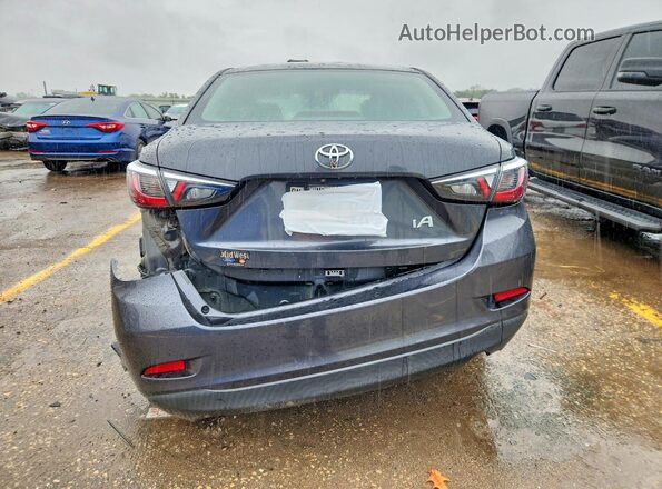 3MYDLBYV6JY323174 2018 TOYOTA YARIS Gray Вид ззаду